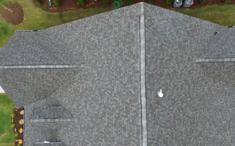 Best Alpharetta Roofer team performing a free roof inspection on a residential home in Alpharetta, GA