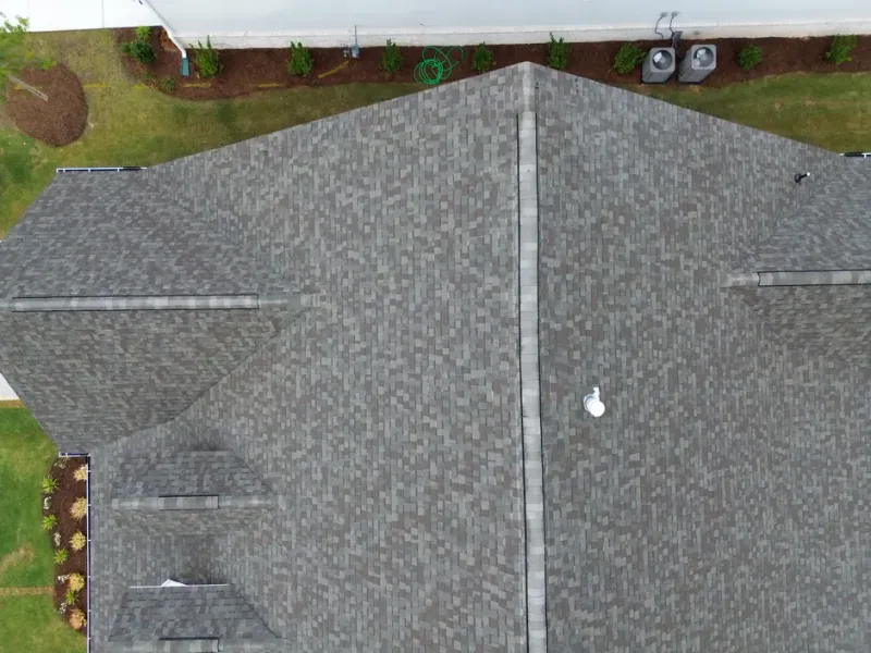 Best Alpharetta Roofer team performing a free roof inspection on a residential home in Alpharetta, GA